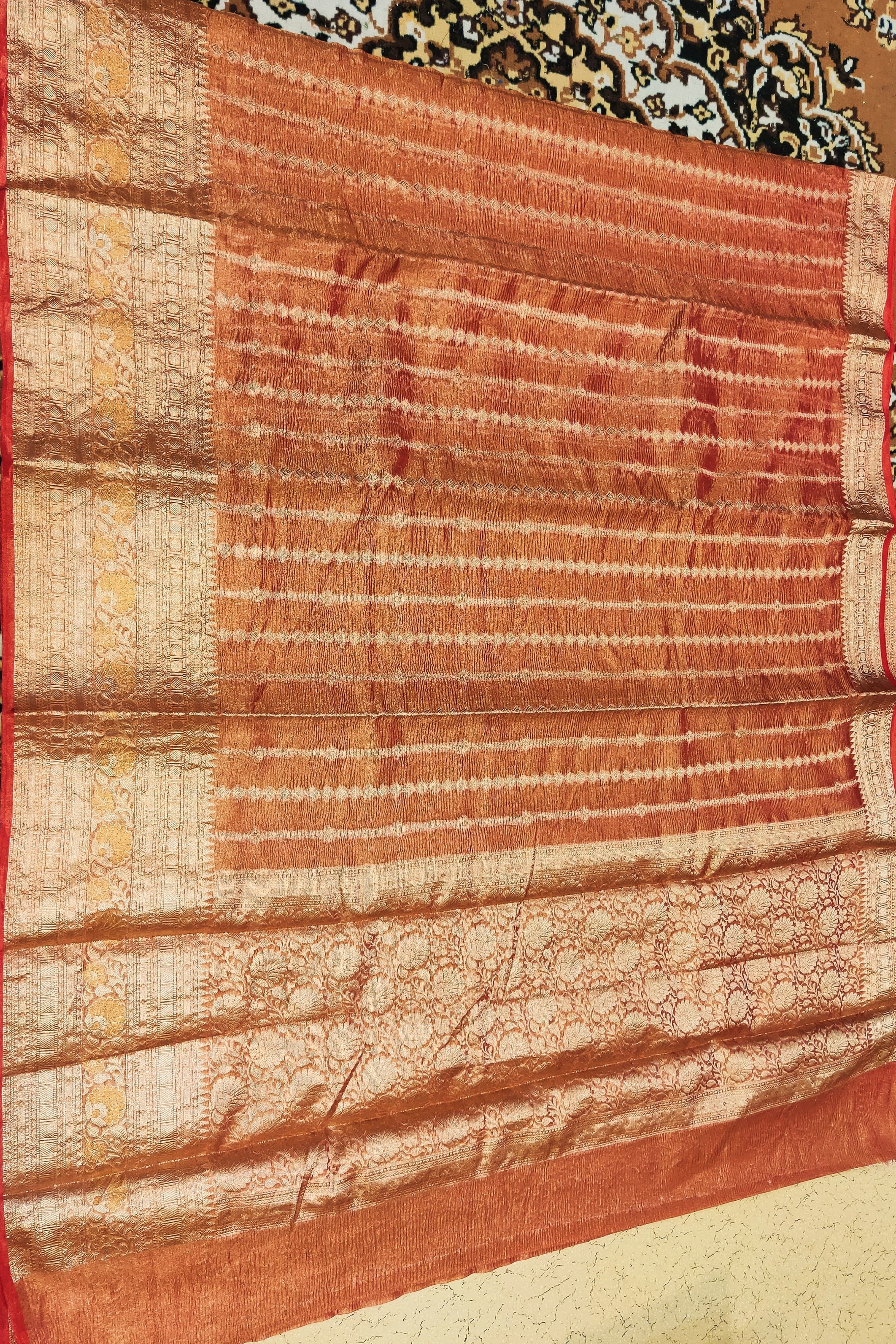 Textured fabric with a pattern on a decorative background
