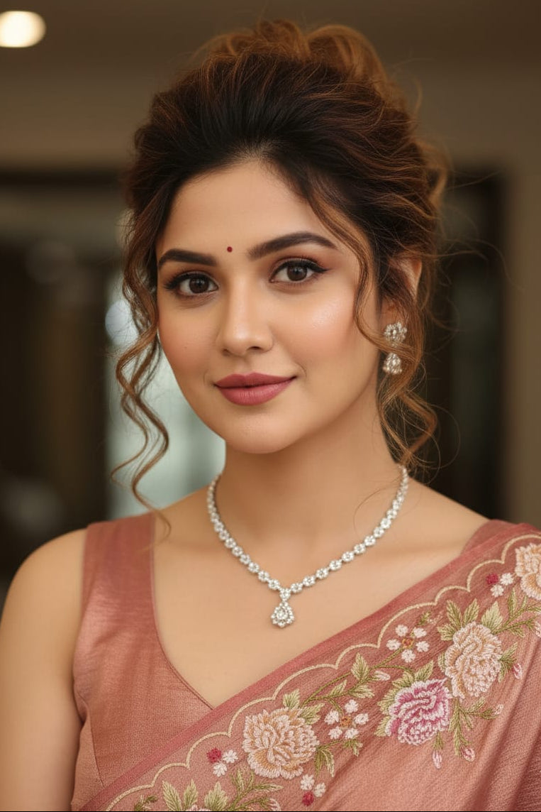 portrait of a woman in a floral saree indoors