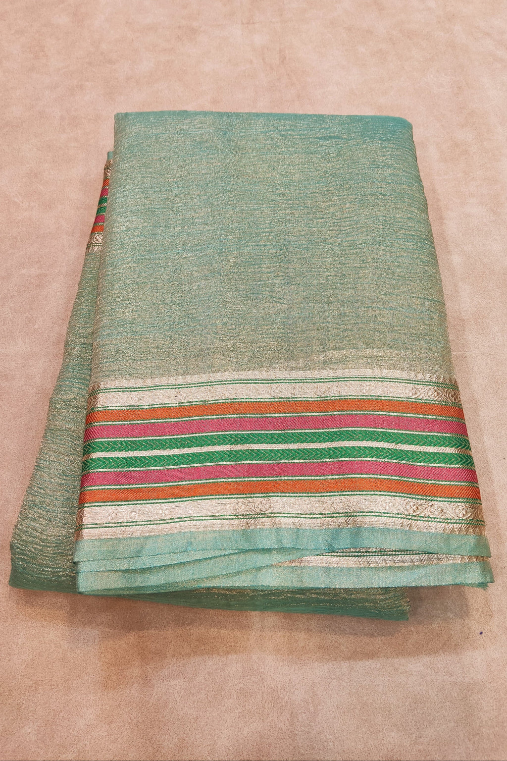 blue saree on a flat surface