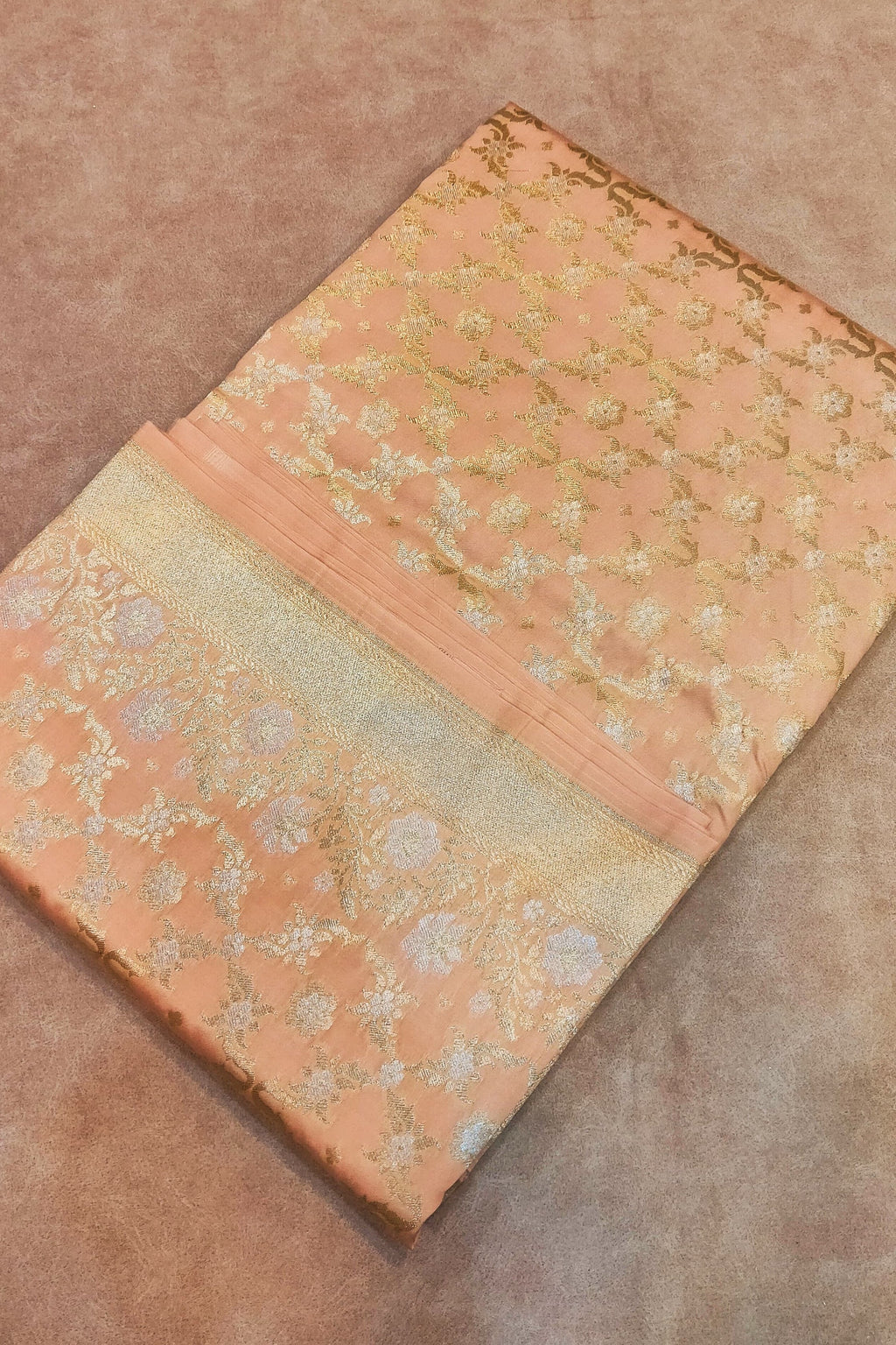 Decorative mat with floral patterns on a textured surface