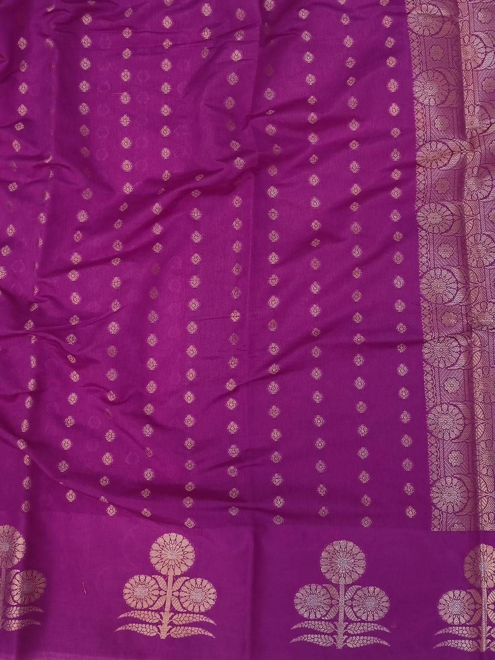 The Sangam Silks Purple Boota Raw Mango Silk Saree with exquisite gold zari work.