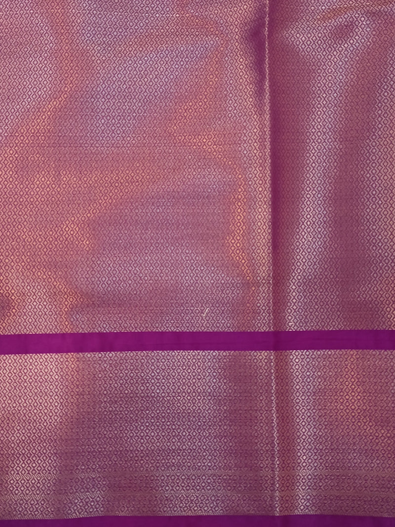 Elegant Purple Boota Raw Mango Silk Saree featuring luxurious Banarasi silk.